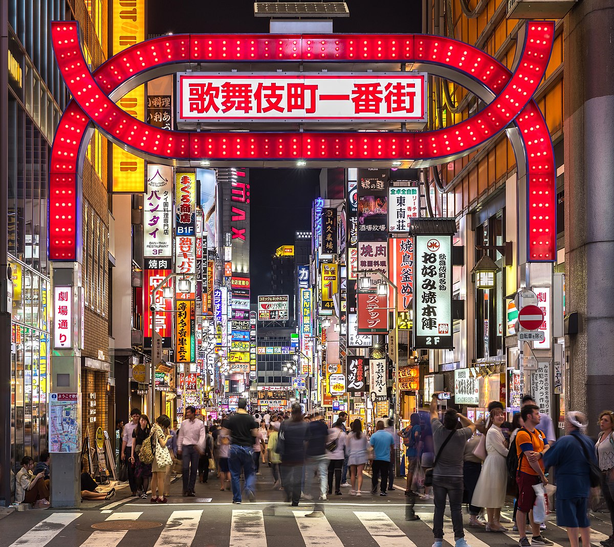 Kabukicho red gate and colorful neon street signs Shinjuku, Tokyo